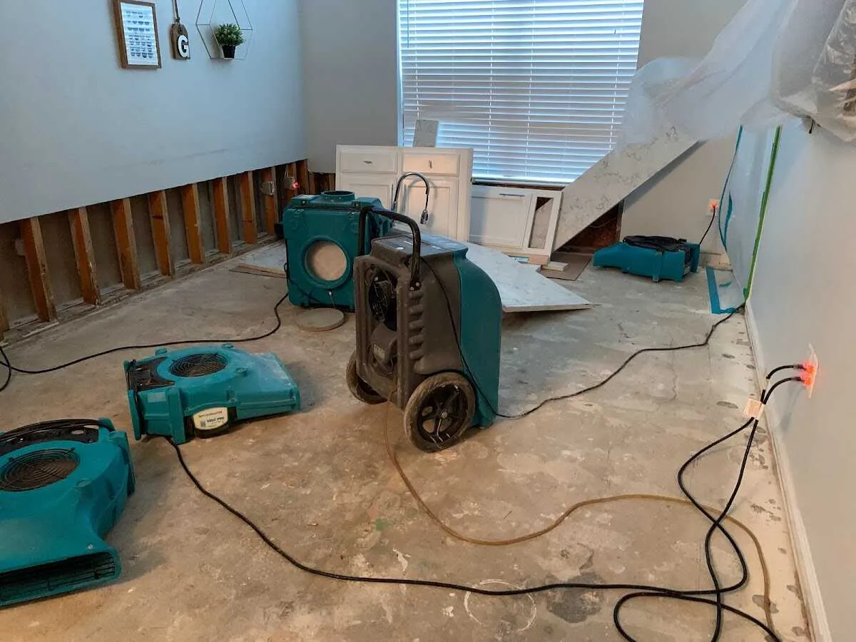 Dehumidifier in flood-cut room for Water Damage Restoration in Paxton